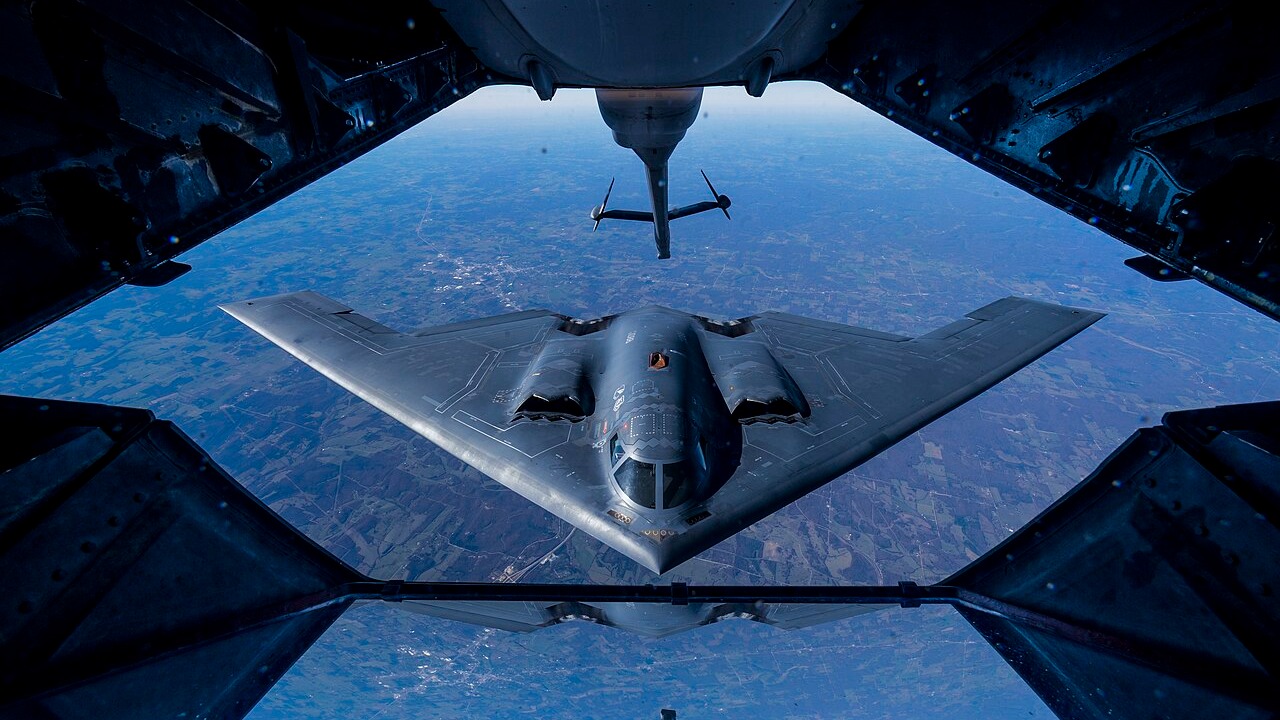 A 2nd Air Refueling Squadron KC-10 Extender from Joint Base McGuire-Dix-Lakehurst, N.J., prepares to refuel a B-2 Spirit, during a training exercise near Kansas, Nov. 10, 2016. The KC-10 Extender is an Air Mobility Command advanced tanker and cargo aircraft designed to provide increased global mobility for U.S. armed forces. Although the KC-l0's primary mission is aerial refueling, it can combine the tasks of a tanker and cargo aircraft by refueling fighters and simultaneously carry the fighter support personnel and equipment on overseas deployments. (U.S. Air Force photo by Senior Airman Keith James/Released) Unit: 3rd Combat Camera Squadron DVIDS Tags: B-2; KC-10; Air refueling; Aircraft; Air Force; AMC; USAF; Air power; boom; Air superiority; 2nd AFS; air fueling squadron; DVIDS Photos of the Day 122316