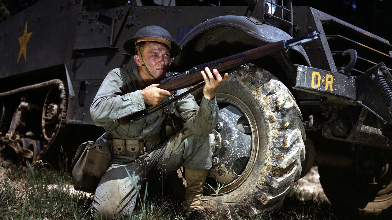 A U.S. Army infantryman wearing the M1 steel helmet at Fort Knox, Kentucky, in 1942.