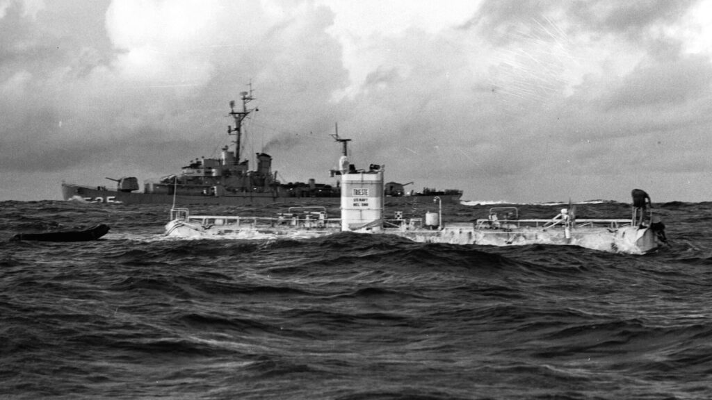 Trieste, with USS Lewis (DE-535) nearby, over the Mariana Trench on Jan. 23, 1960.