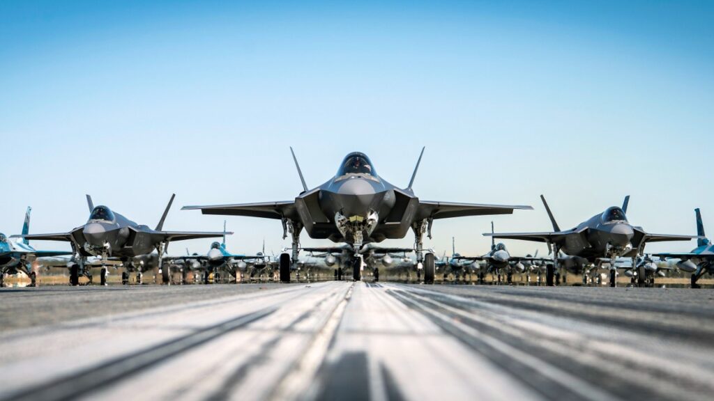 F-35A Lightning IIs and F-16 Fighting Falcons of the 354th Fighter Wing assemble during a readiness exercise at Eielson Air Force Base, Alaska, on May 20, 2022.
