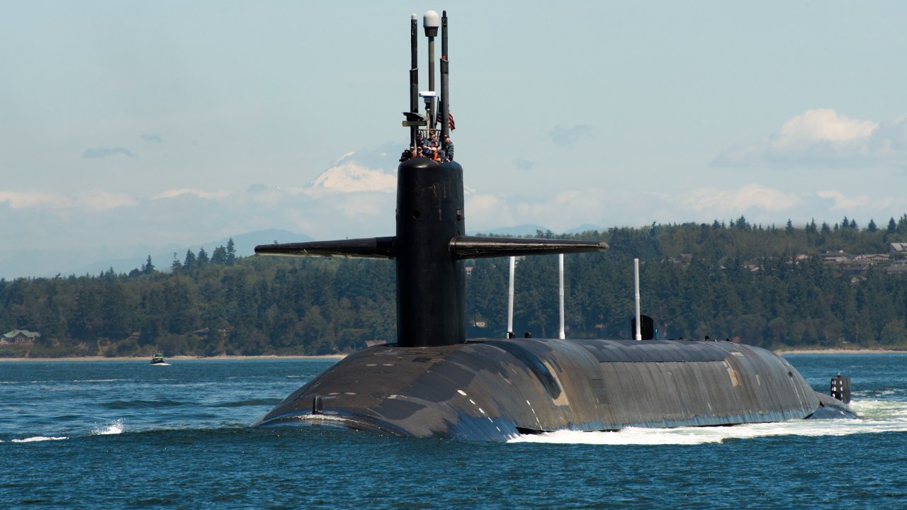 USS Pennsylvania (SSBN 735) returns to Naval Base Kitsap-Bangor, Washington, after a strategic deterrence patrol on July 28, 2015, before its move to Kings Bay.
