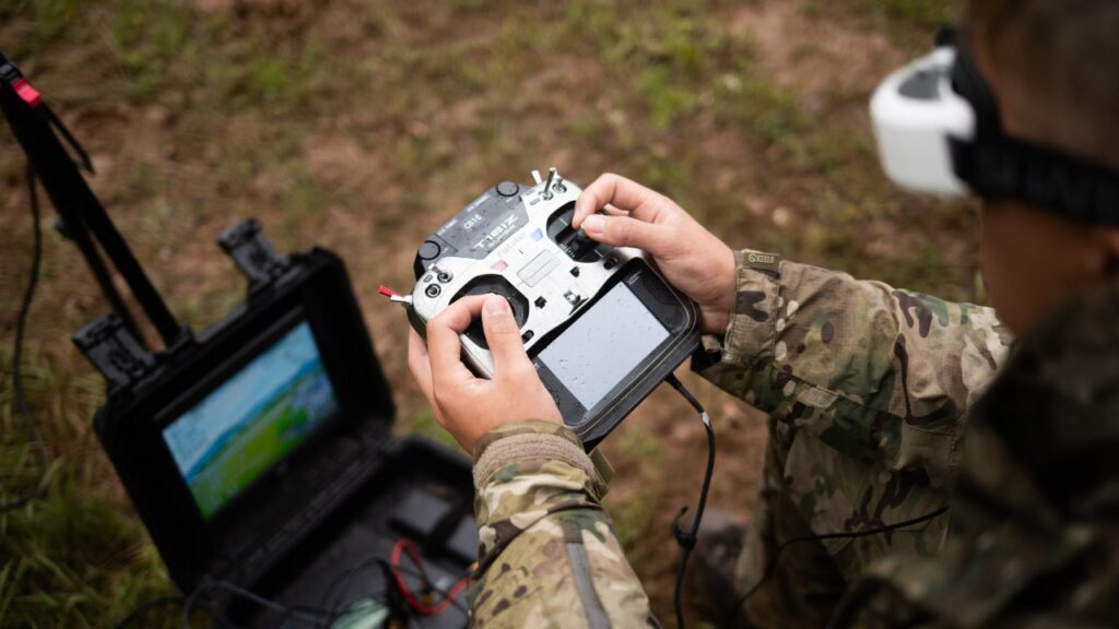 A British Army soldier of the 2nd Battalion, Royal Yorkshire Regiment, operates a drone during Project Flytrap training in Hohenfels, Germany, on June 8, 2025. It is not from the Drone Wars…