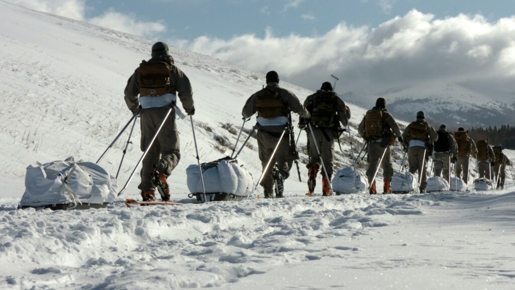 U.S. Army Special Forces soldiers hauling sleds during cold-weather training
