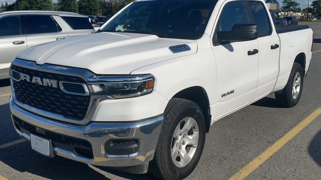 White Ram 1500 pickup truck in a parking lot