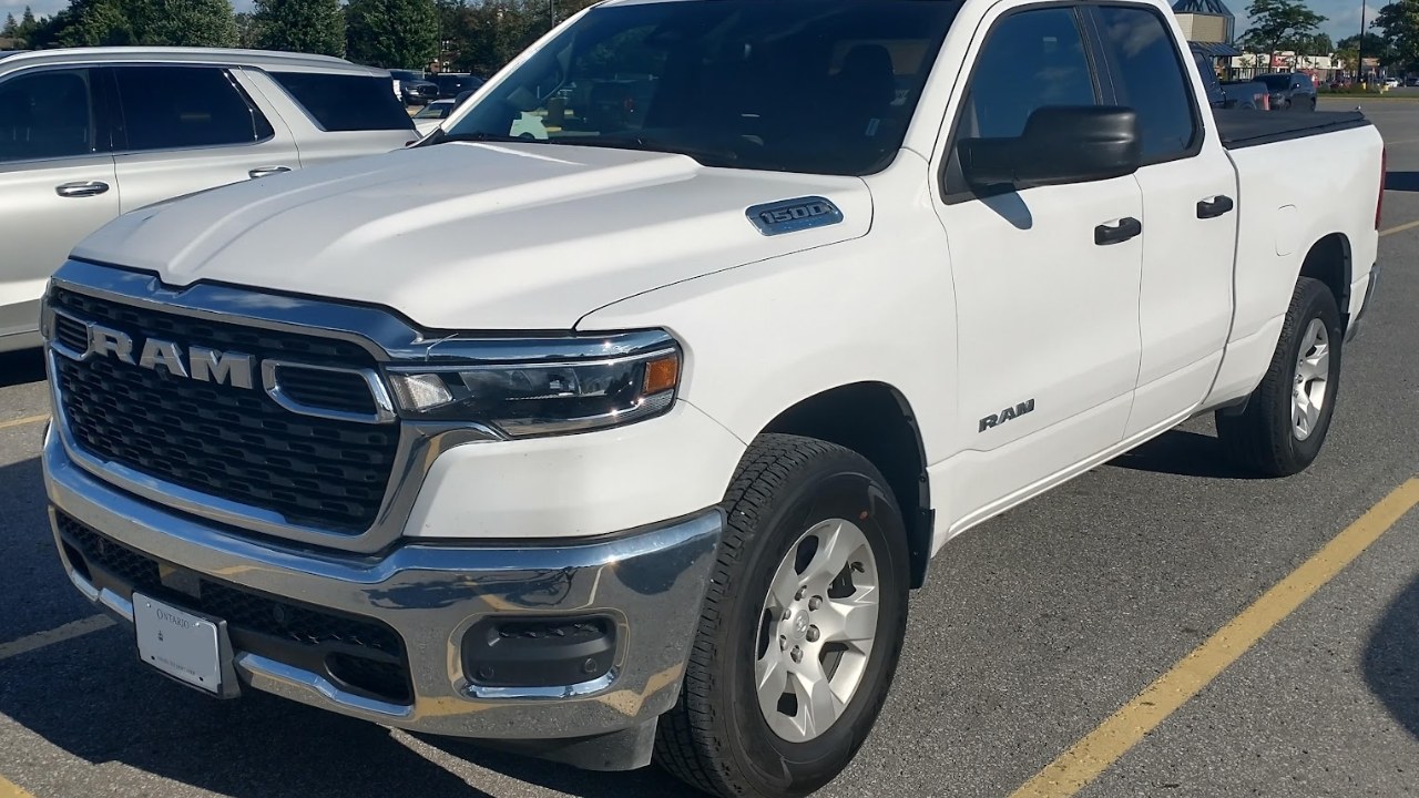 White Ram 1500 pickup truck in a parking lot