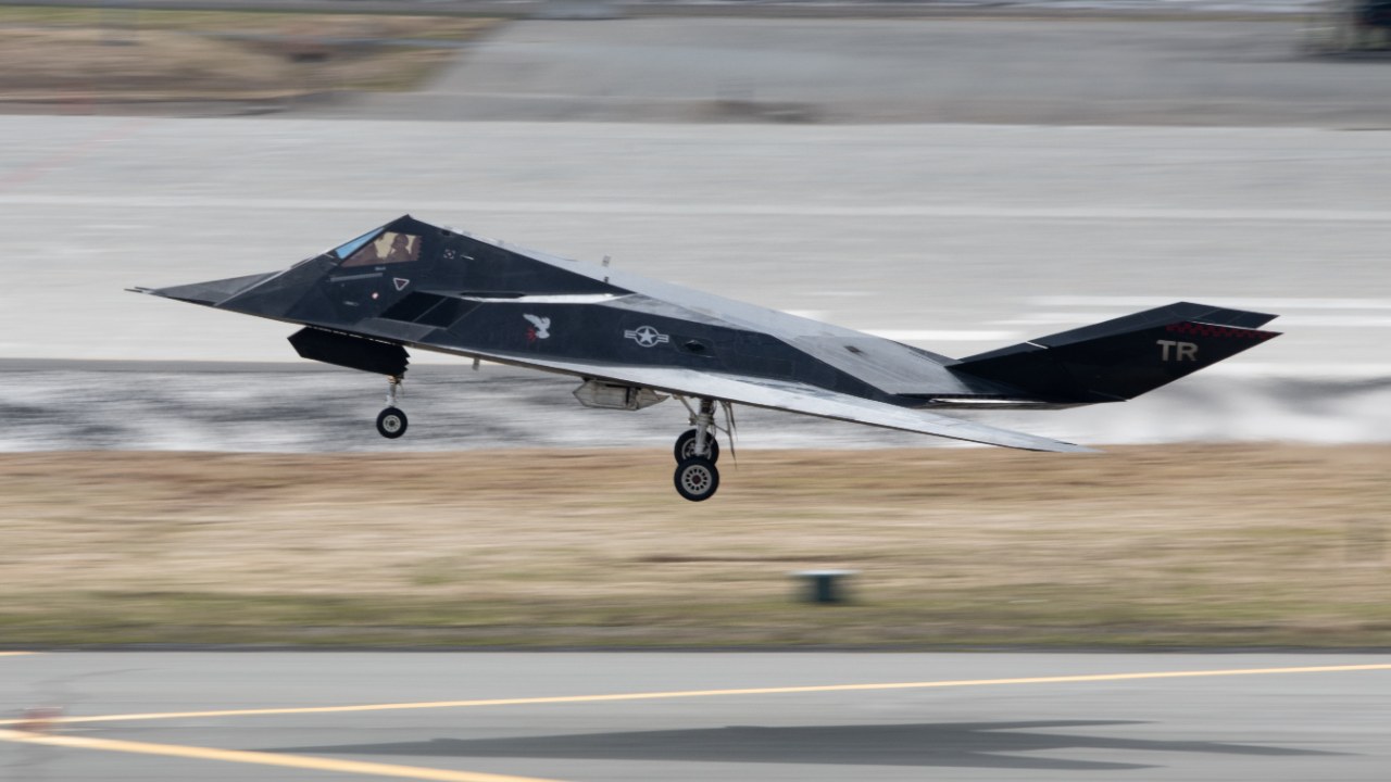 F-117 Nighthawk stealth jet landing on a runway
