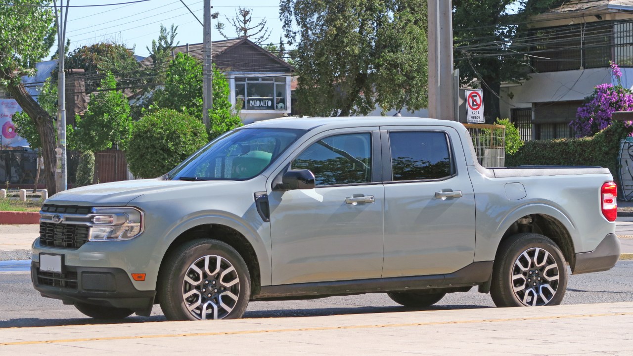 Silver Ford Maverick Hybrid pickup parked on a street