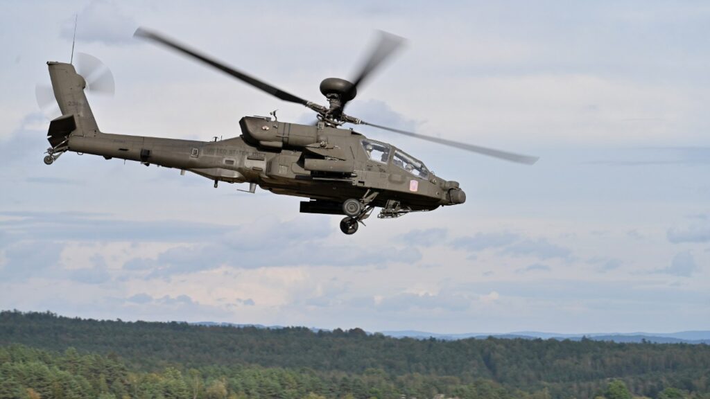 AH-64E Apache helicopter flying over the Grafenwoehr Training Area