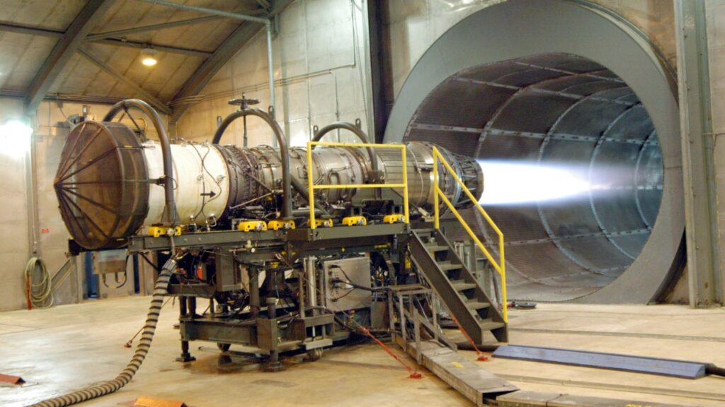 Jet engine on a test stand with afterburner lit