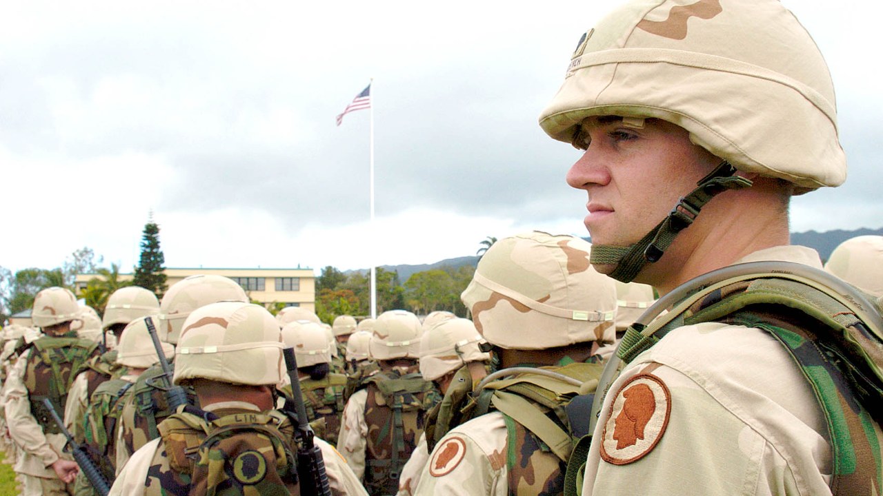 U.S. soldiers in formation wearing PASGT Kevlar helmets