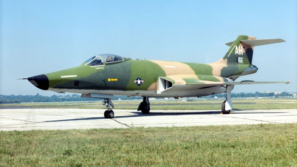 Camouflaged RF-101C Voodoo reconnaissance jet on display
