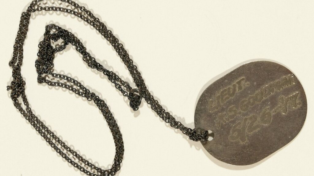 Kenneth Sawyer Goodman's identification tag, from the Newberry Library collection. It is not one of the 1917 Navy fingerprint tags described here