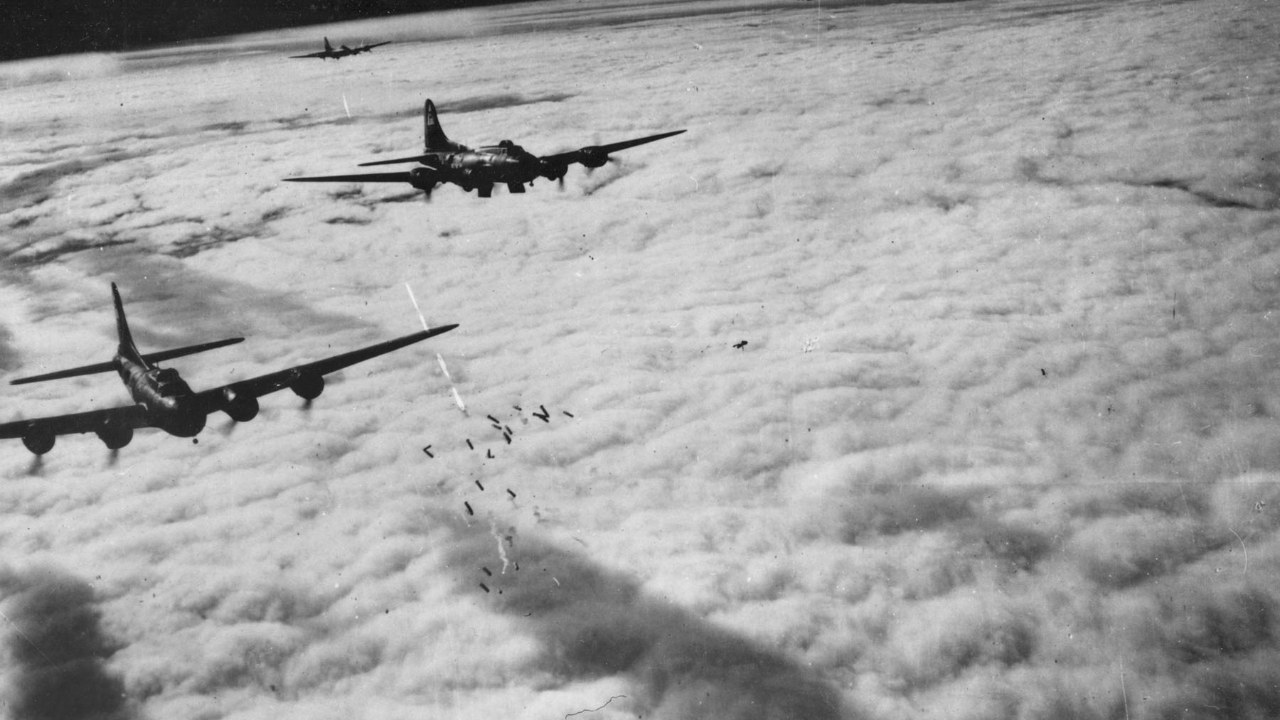 Eighth Air Force B-17F Flying Fortresses bombing through cloud over Germany, November 1943.